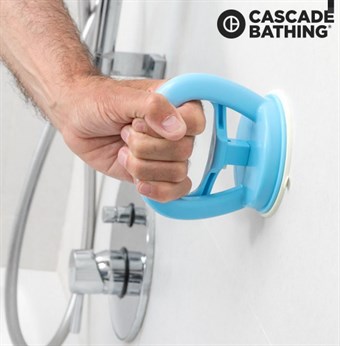 Support handle with suction cup for the bath