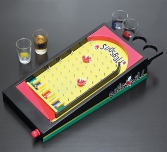 Pinball game with shot glass
